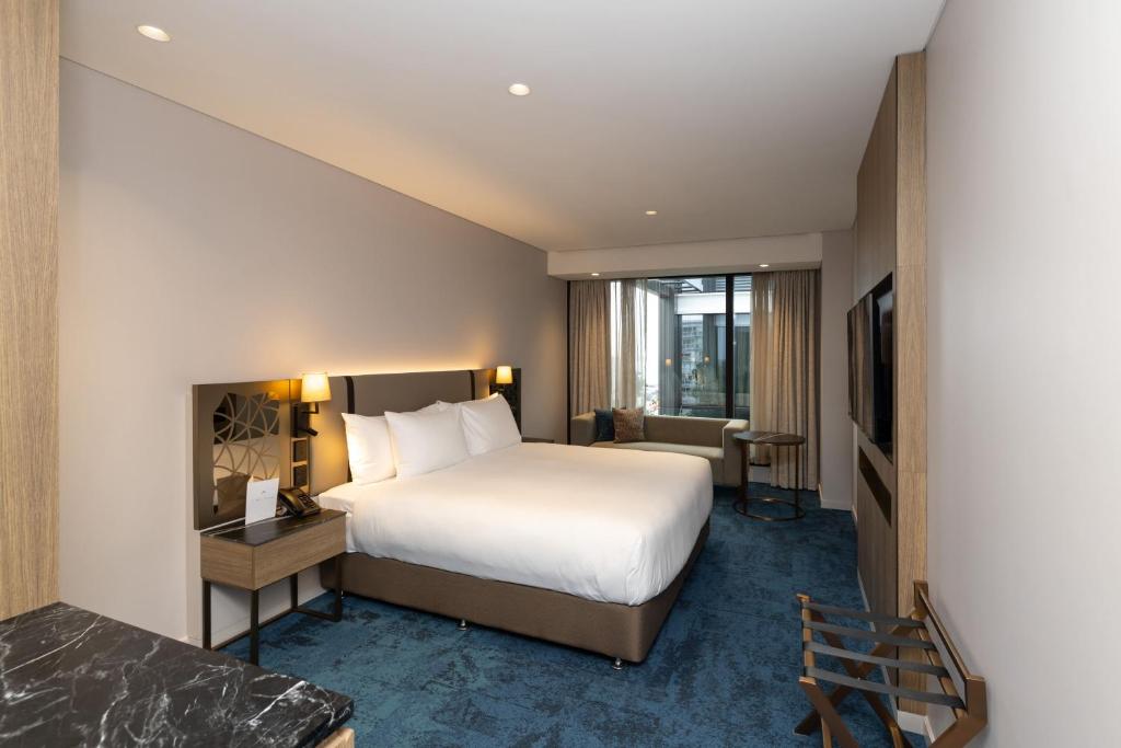Postel nebo postele na pokoji v ubytování Hotel Grand Chancellor Auckland