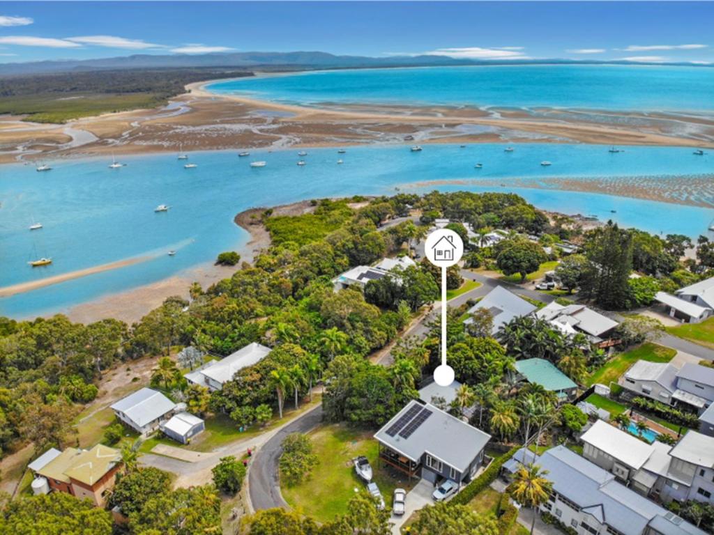 an aerial view of a resort with a clock tower at 1770 Horizons holiday house - pet friendly home in 1770 in Seventeen Seventy