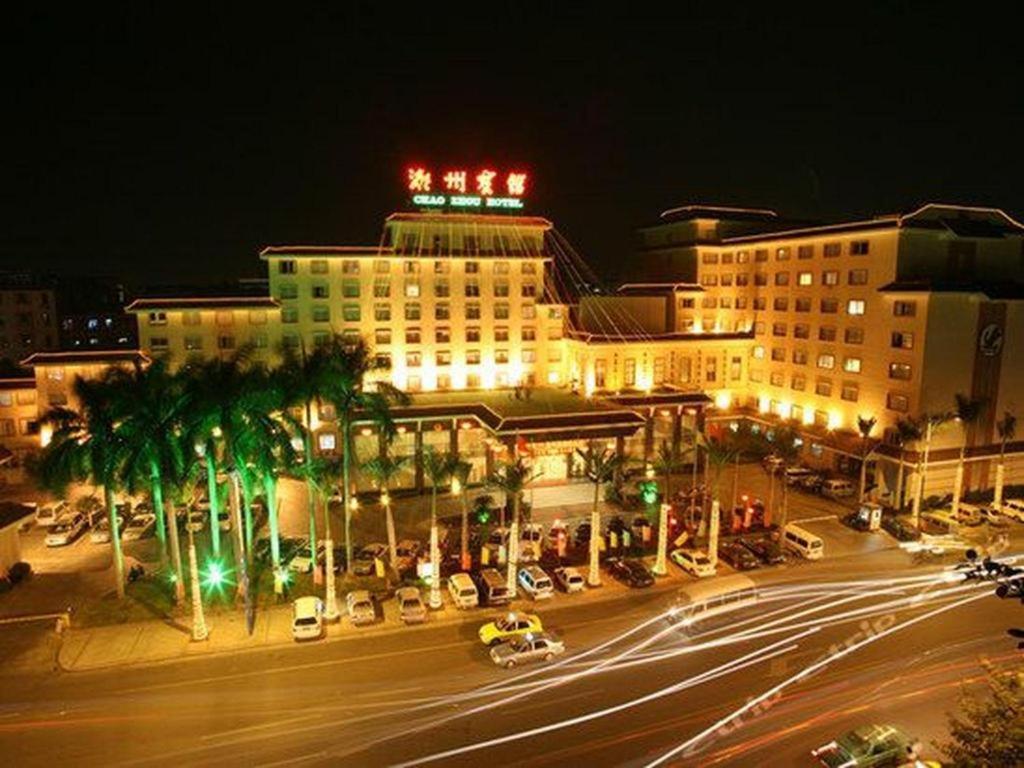 a night view of a large building with a street at Chaozhou Hotel in Chaozhou