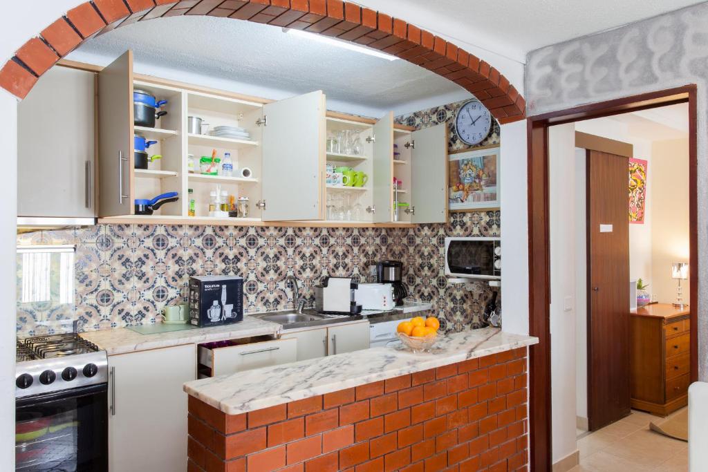 Kuchyň nebo kuchyňský kout v ubytování Apartamento Cardoso
