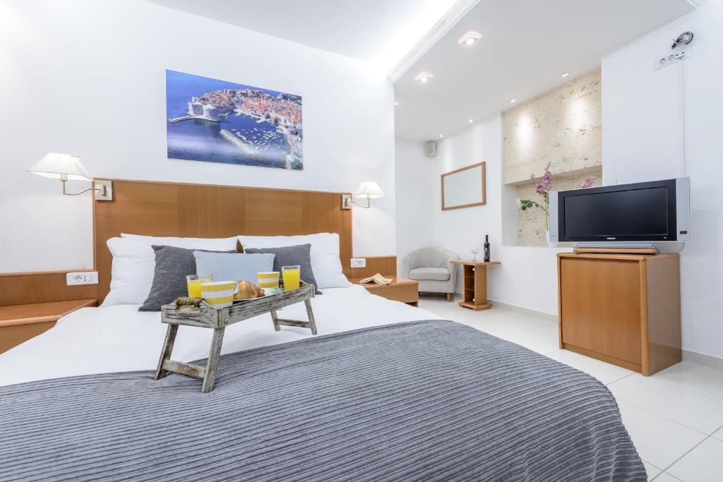 TV a/nebo společenská místnost v ubytování Adriatic Deluxe Apartments