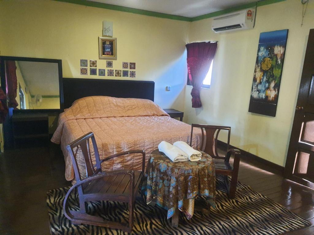 Postel nebo postele na pokoji v ubytování GV Resort