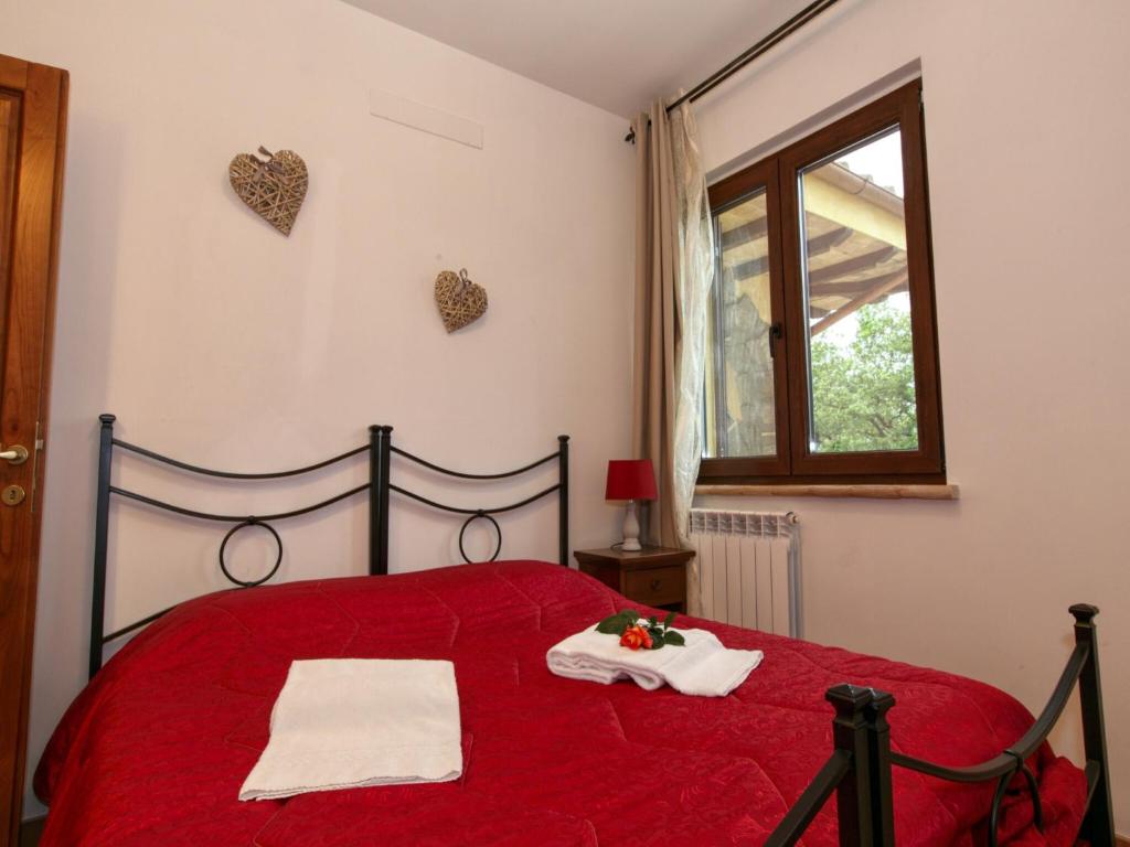 Posteľ alebo postele v izbe v ubytovaní Peaceful Villa in Montefiascone with Bubble Bath