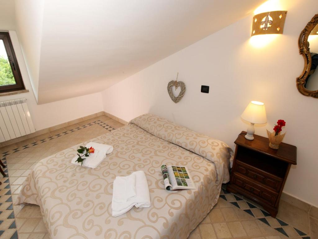 Posteľ alebo postele v izbe v ubytovaní Peaceful Villa in Montefiascone with Bubble Bath