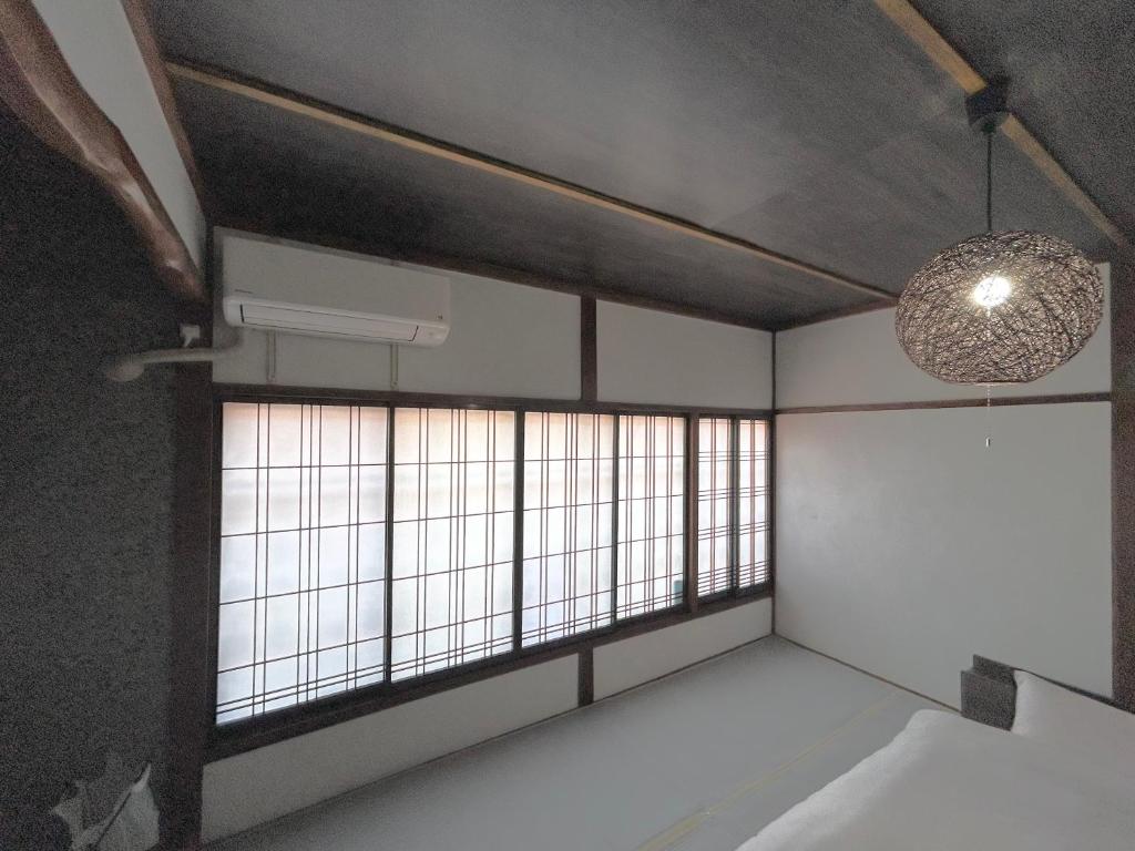 Postel nebo postele na pokoji v ubytování 奈良井駅徒歩10分中山道奈良井宿古民家一棟貸し御宿美里屋