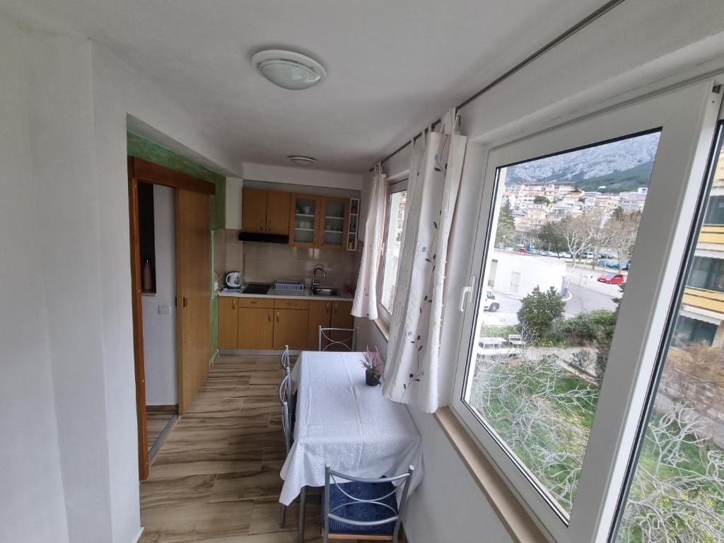 Kuchyň nebo kuchyňský kout v ubytování Apartments Luxury Oasis