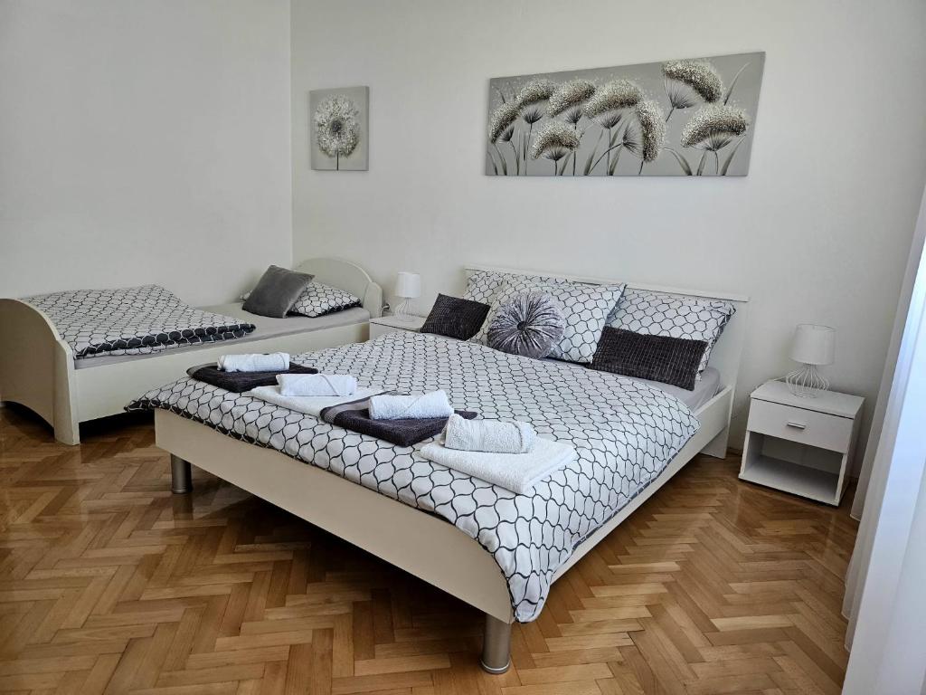Posteľ alebo postele v izbe v ubytovaní Apartman "Roko"
