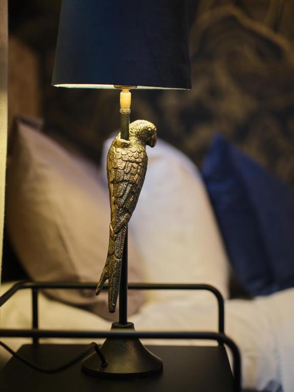 Postel nebo postele na pokoji v ubytování HAGA Hotell & Bistro