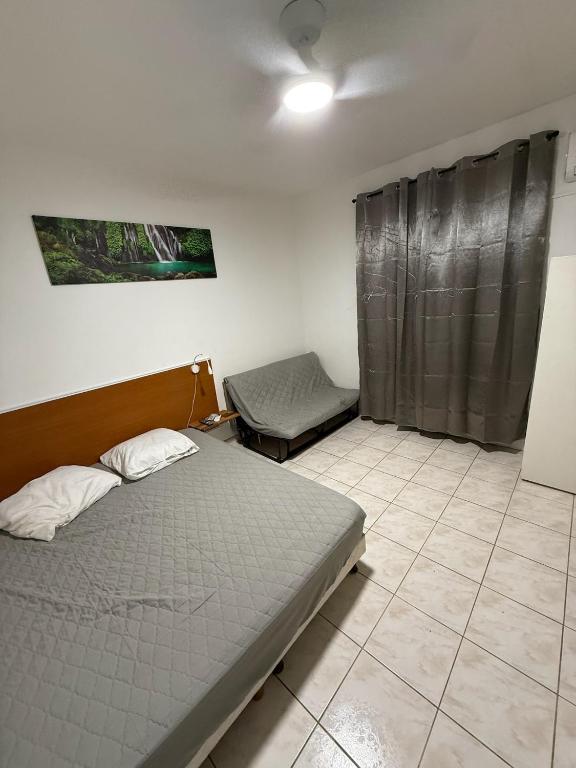 Postel nebo postele na pokoji v ubytování La suite Corossol