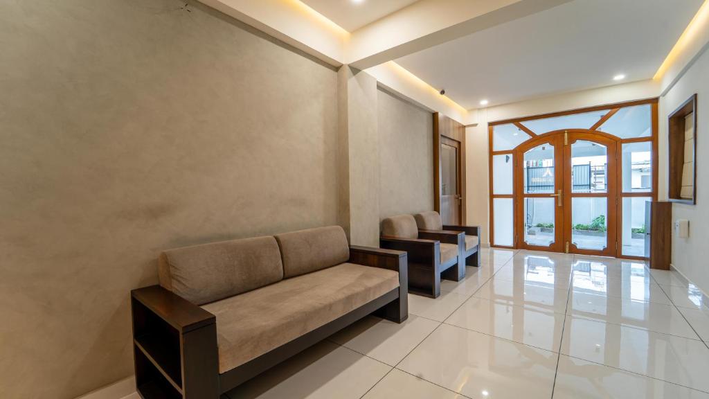 Posezení v ubytování Treebo Petals Suites