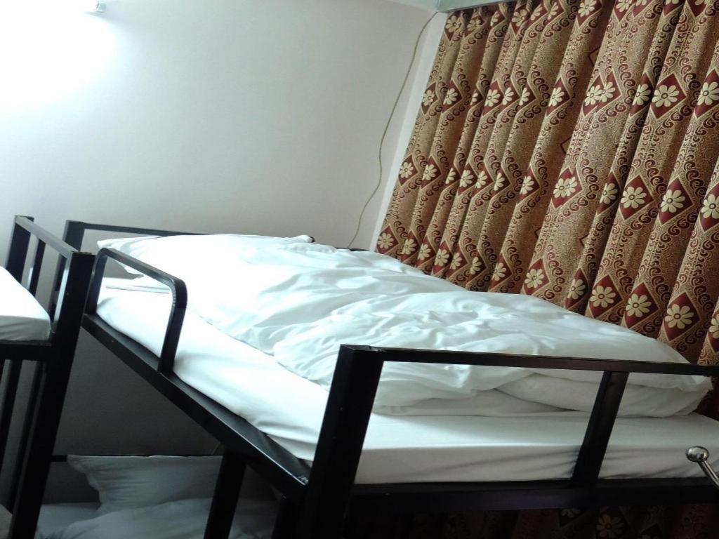 Postel nebo postele na pokoji v ubytování Halong Happy Hostel