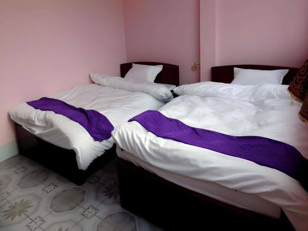 Postel nebo postele na pokoji v ubytování Halong Happy Hostel