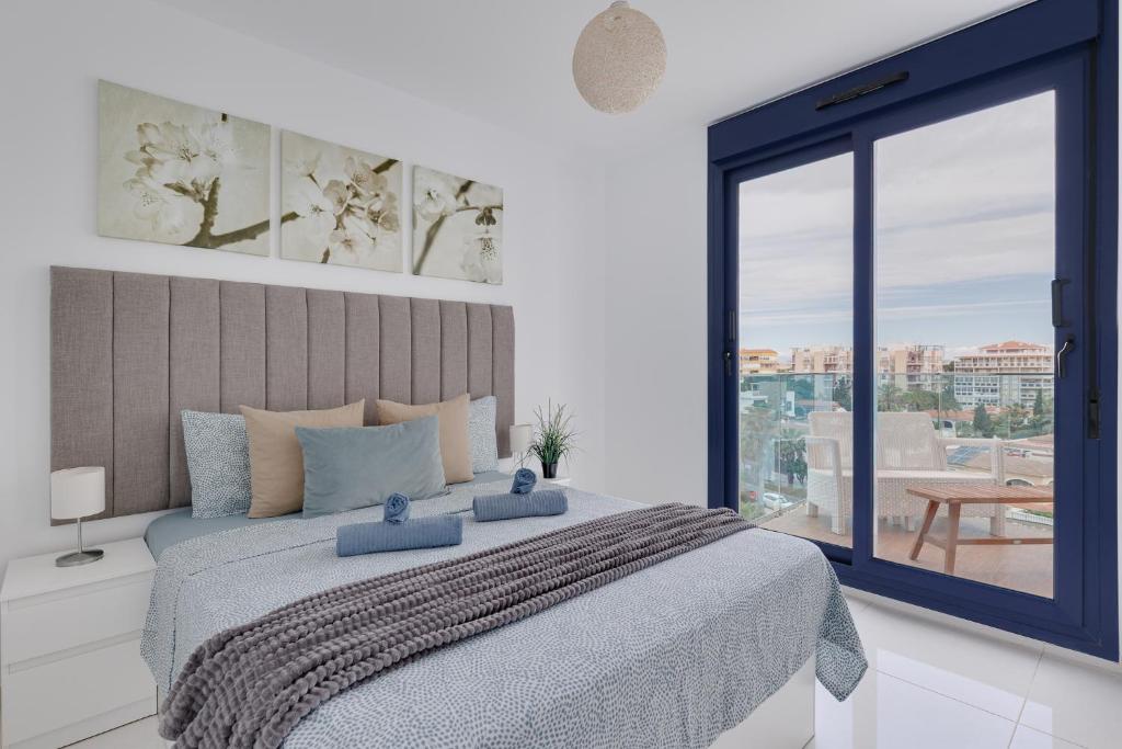 A bed or beds in a room at Sea Senses Blue Ocean