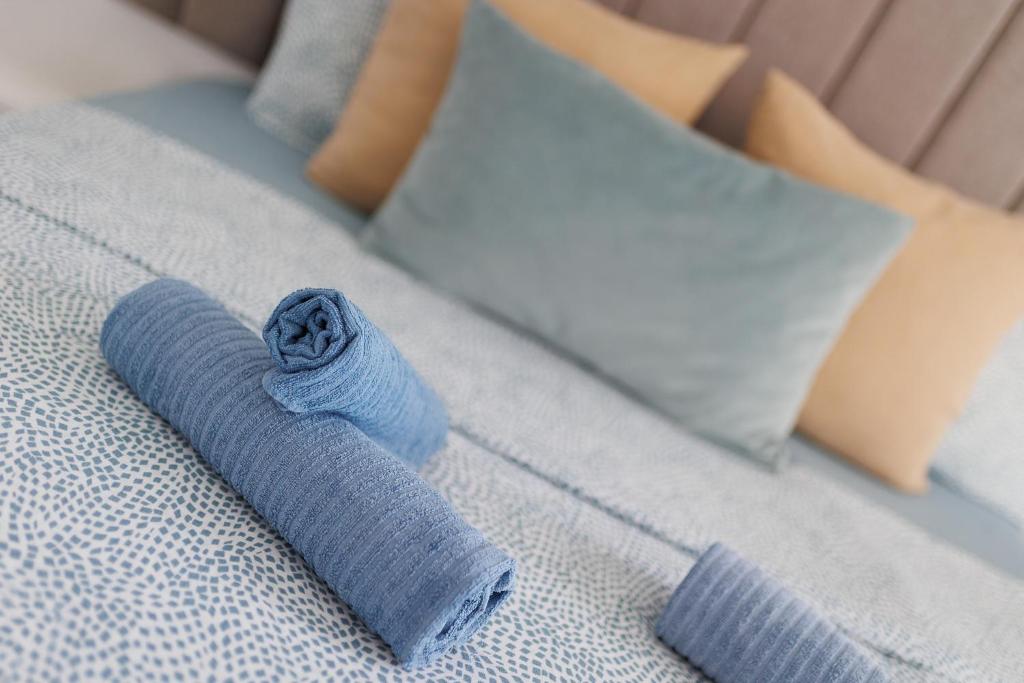 A bed or beds in a room at Sea Senses Blue Ocean