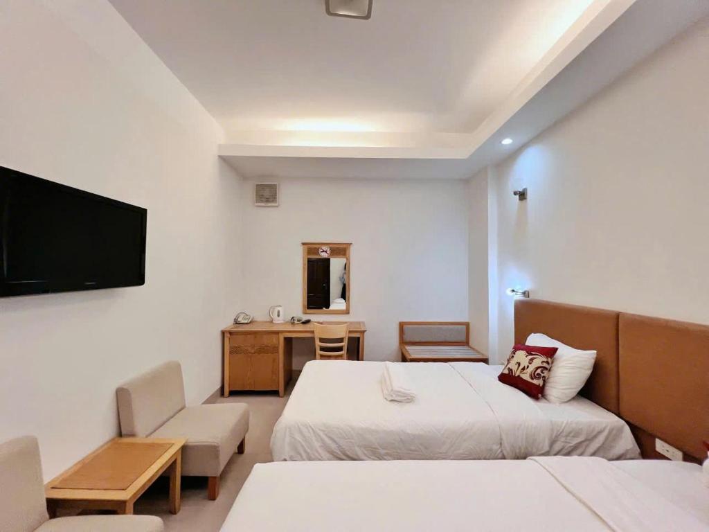 TV a/nebo společenská místnost v ubytování Sophia Sky Hotel