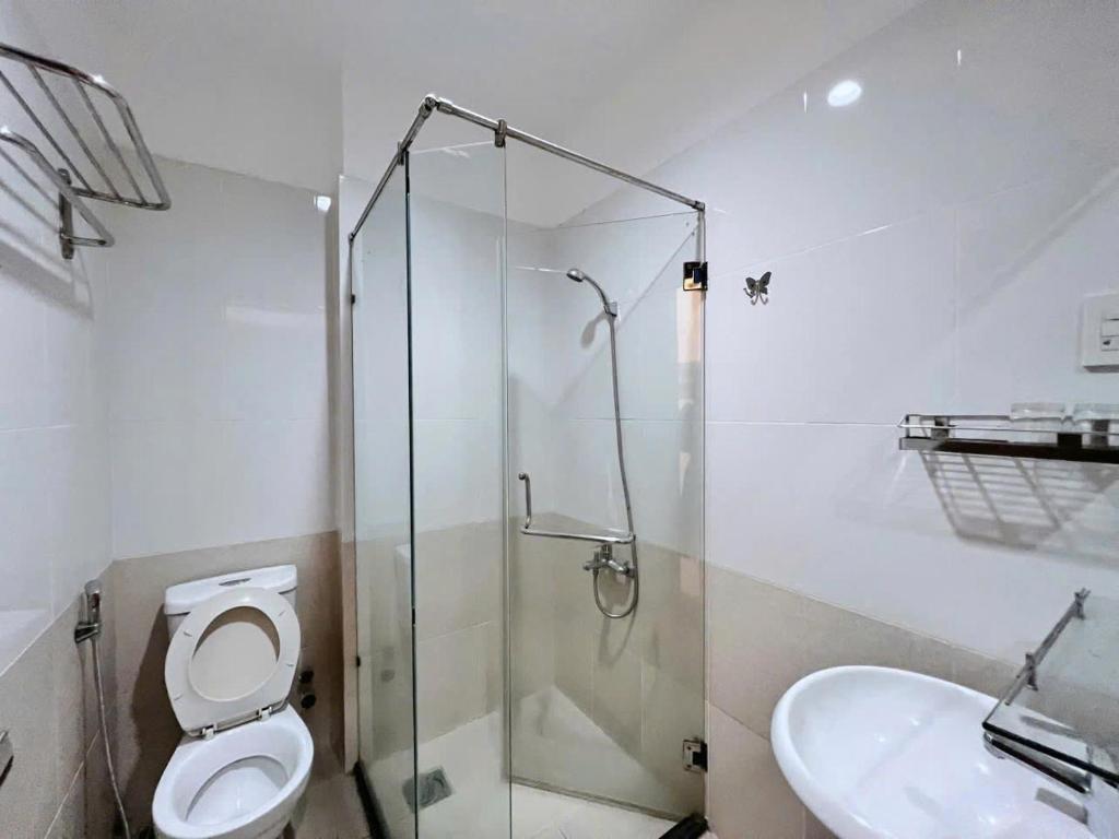 Koupelna v ubytování Sophia Sky Hotel