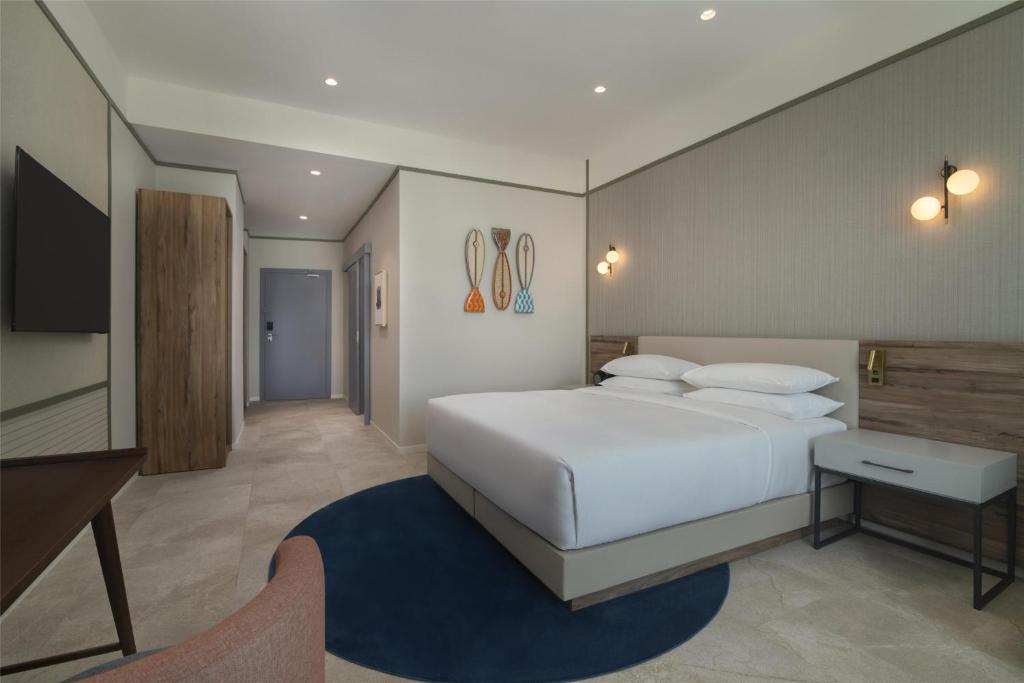 Postel nebo postele na pokoji v ubytování Hyatt Centric Santo Domingo