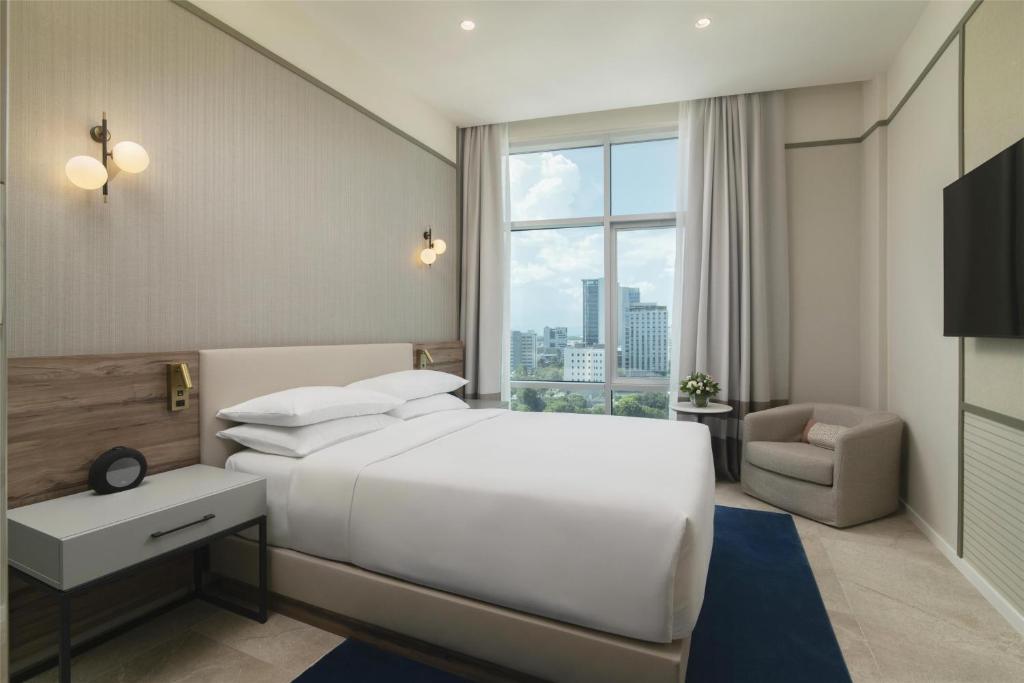 Postel nebo postele na pokoji v ubytování Hyatt Centric Santo Domingo