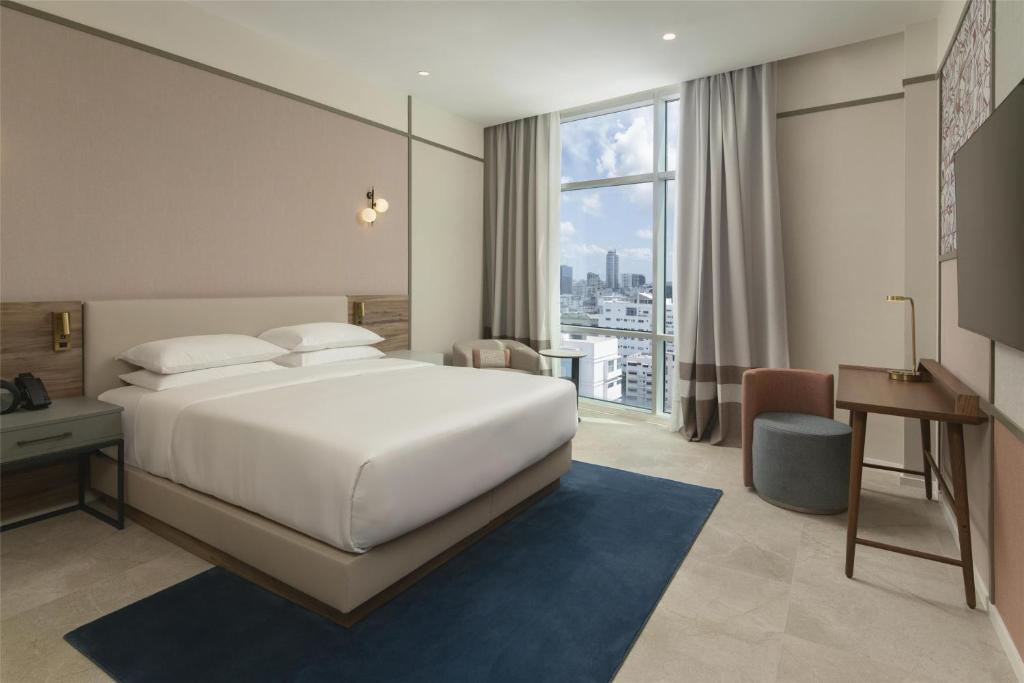 Postel nebo postele na pokoji v ubytování Hyatt Centric Santo Domingo