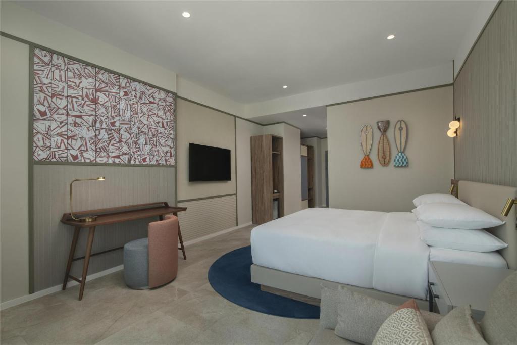 Postel nebo postele na pokoji v ubytování Hyatt Centric Santo Domingo