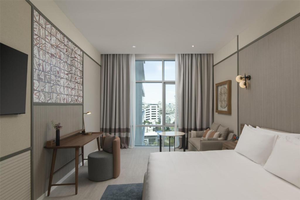 Postel nebo postele na pokoji v ubytování Hyatt Centric Santo Domingo