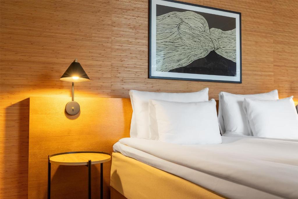 Postel nebo postele na pokoji v ubytování Hyatt Place Gothenburg Central