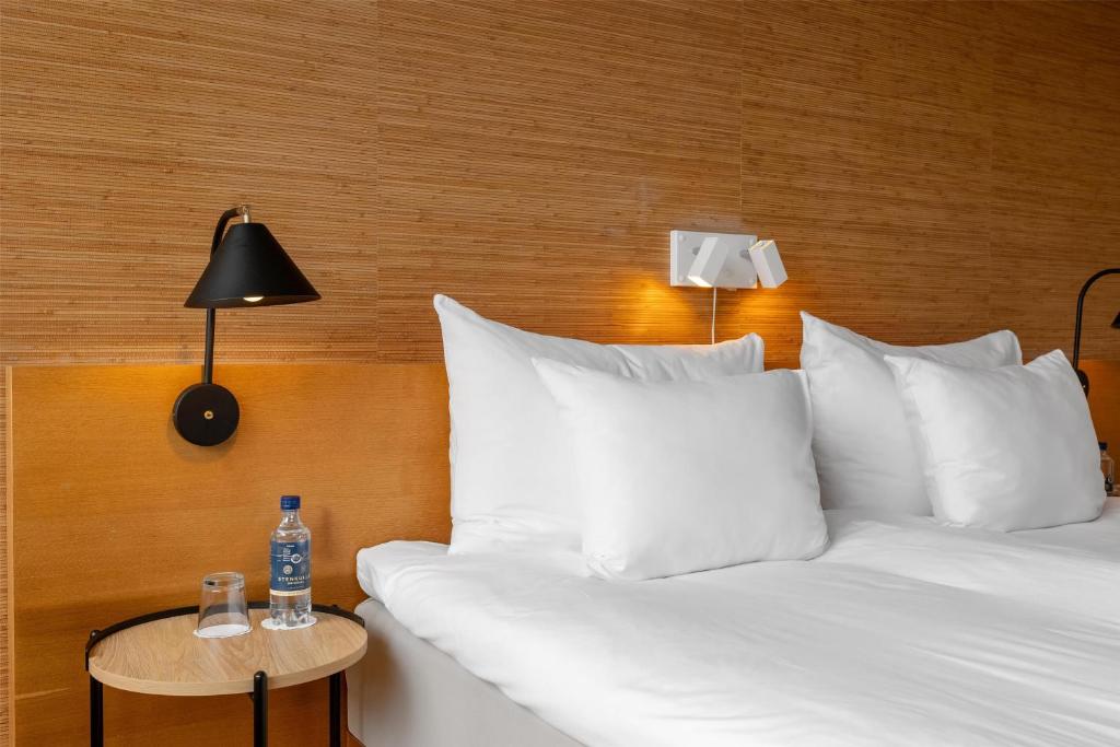 Postel nebo postele na pokoji v ubytování Hyatt Place Gothenburg Central