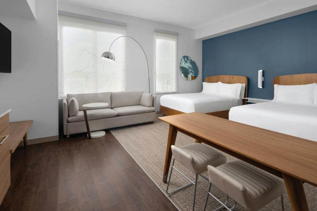 
Queen Room with Two Queen Beds and Sofa Bed
