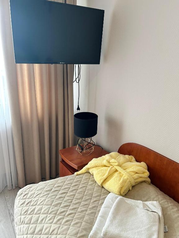 Postel nebo postele na pokoji v ubytování Sanatorium Fala