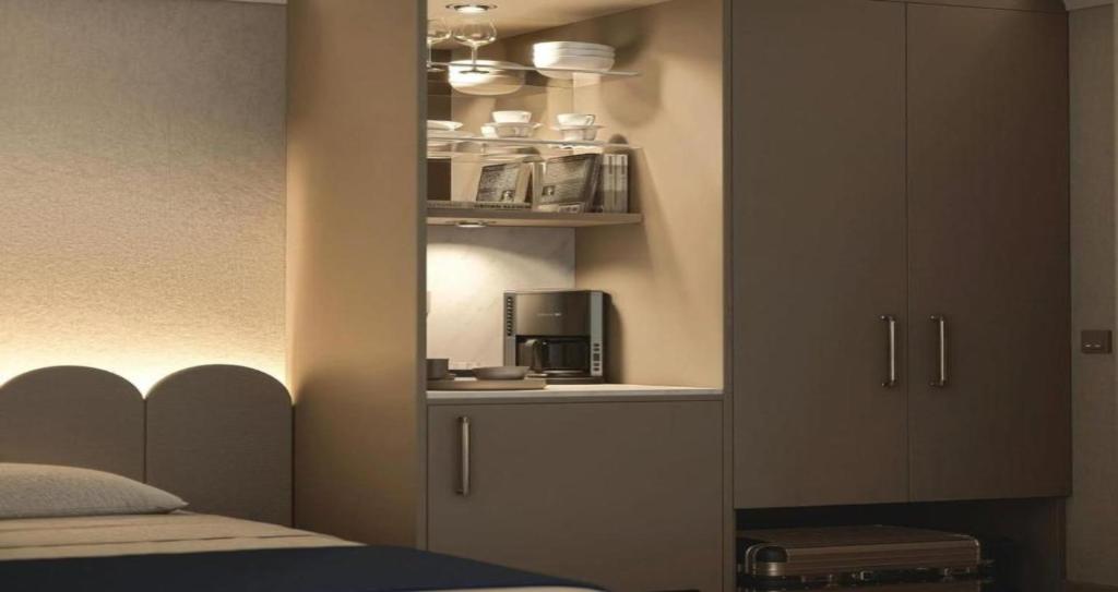 Postel nebo postele na pokoji v ubytování EL DE Olive Aero Suites Near Delhi Airport