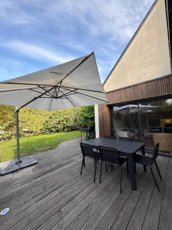 Patio nebo venkovní prostory v ubytování Charmante maison à 5min de la plage et du golf