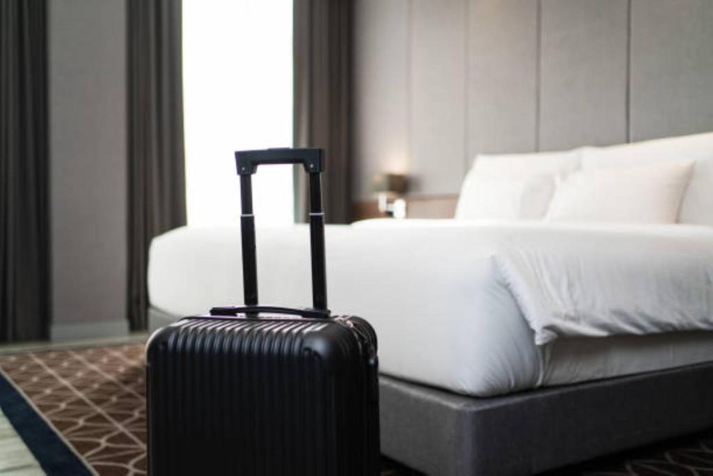 Postel nebo postele na pokoji v ubytování EL DE Olive Aero Suites Near Delhi Airport