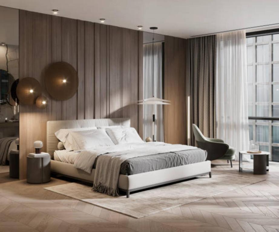 Postel nebo postele na pokoji v ubytování EL DE Olive Aero Suites Near Delhi Airport