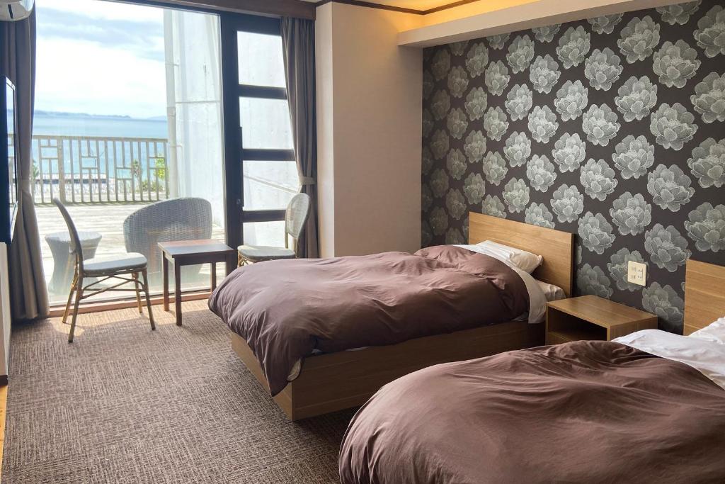 Postel nebo postele na pokoji v ubytování Ooedo Onsen Monogatari Hotel Ranpu