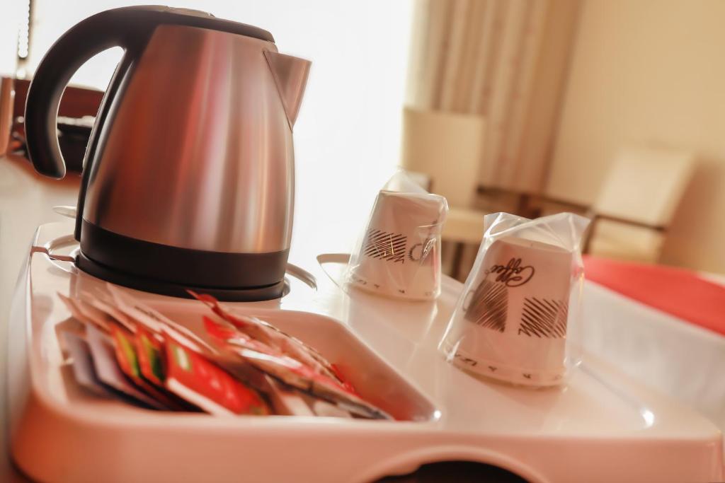 Příslušenství pro přípravu čaje a kávy v ubytování Side Kum Hotel
