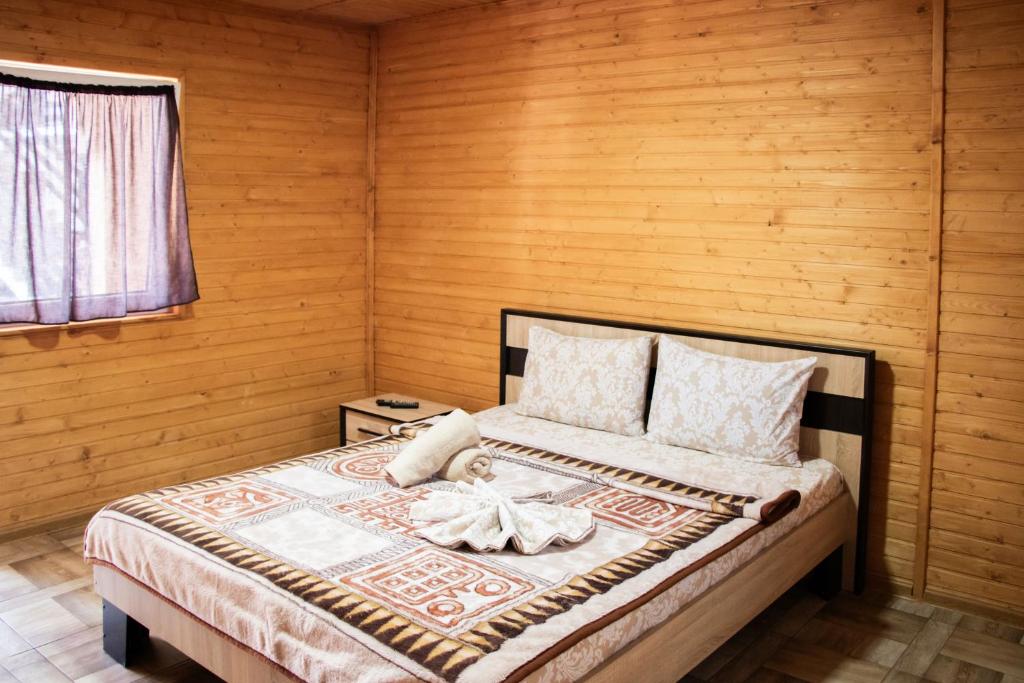 Postel nebo postele na pokoji v ubytování Hotel BILYI AIST