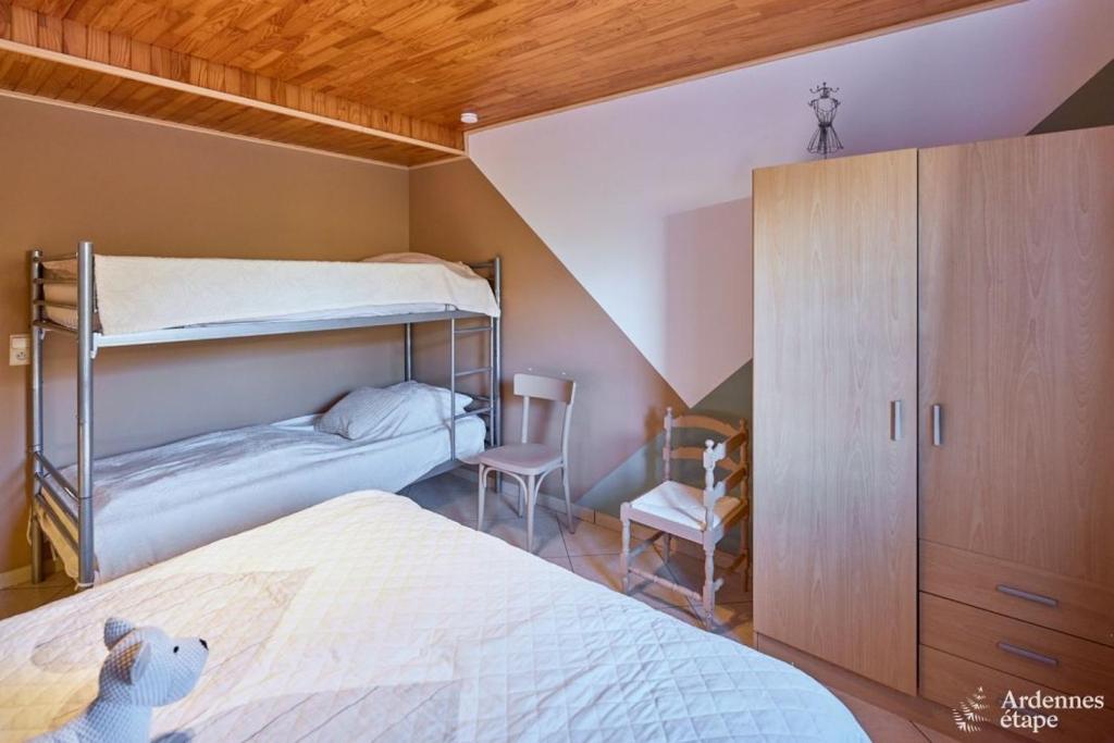 Postel nebo postele na pokoji v ubytování Les Gîtes du Rancourt