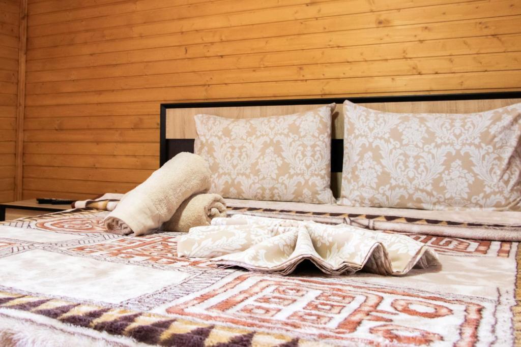 Postel nebo postele na pokoji v ubytování Hotel BILYI AIST