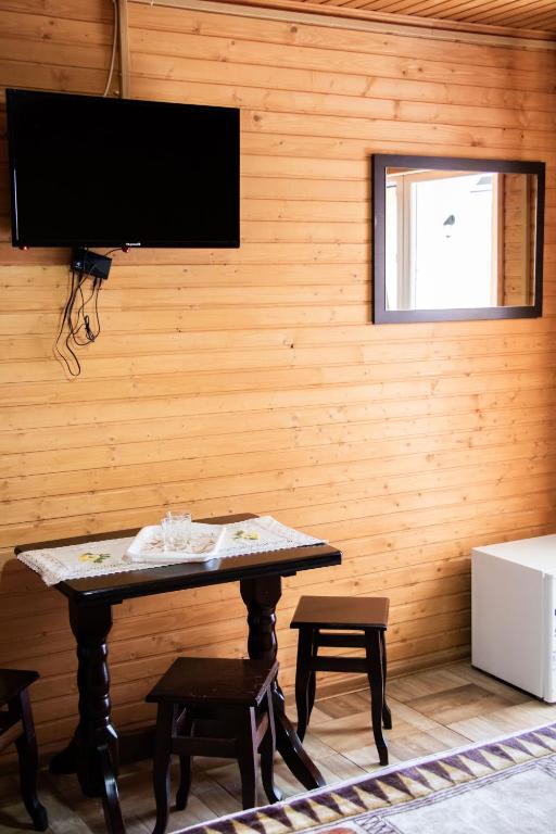 TV a/nebo společenská místnost v ubytování Hotel BILYI AIST