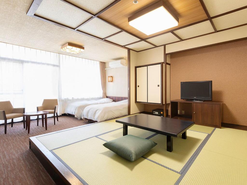 TV a/nebo společenská místnost v ubytování Ooedo Onsen Monogatari Premium Hotel New Shiobara