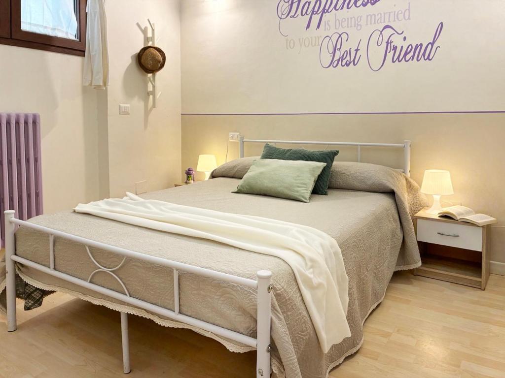 Ένα ή περισσότερα κρεβάτια σε δωμάτιο στο Holihome Le Orchidee