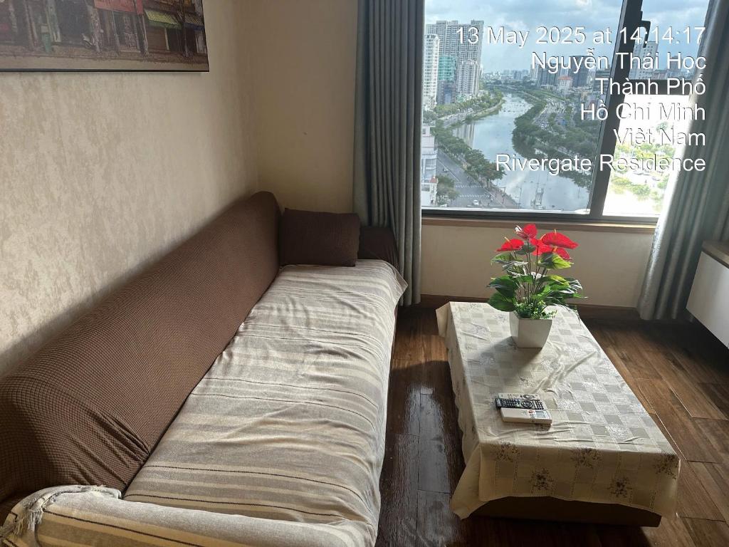 Posezení v ubytování Olala Saigon Apartment in Rivergate Building