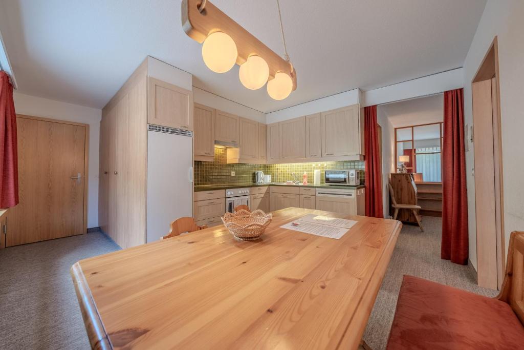 Kuchyň nebo kuchyňský kout v ubytování Rehwiesa A11 by Arosa Vacations