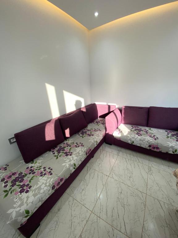 Postel nebo postele na pokoji v ubytování Duplex El mansoura A0