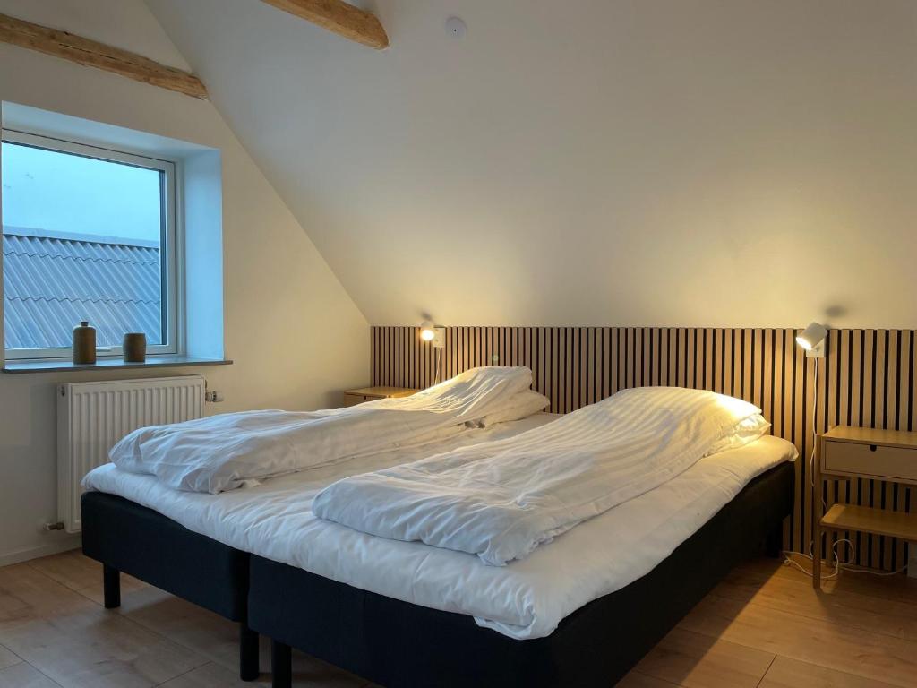 Postel nebo postele na pokoji v ubytování Motel Hune Apartments