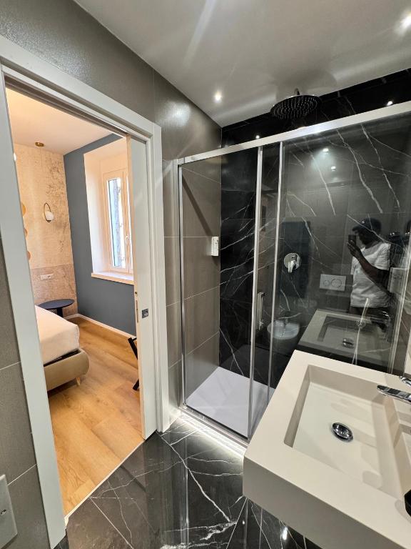 Koupelna v ubytování Maison Rasella Palace Suites