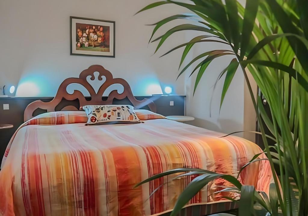 Postel nebo postele na pokoji v ubytování Bridge Hotel