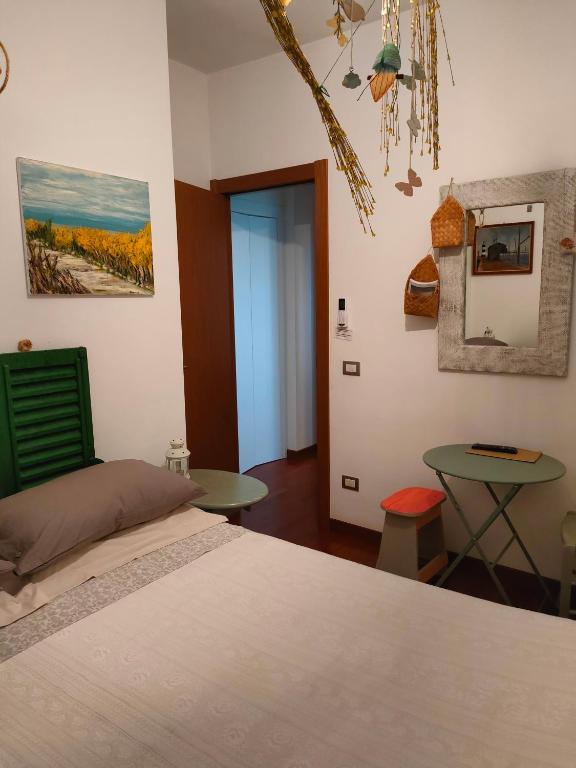 Postel nebo postele na pokoji v ubytování Vistazzurra B&B