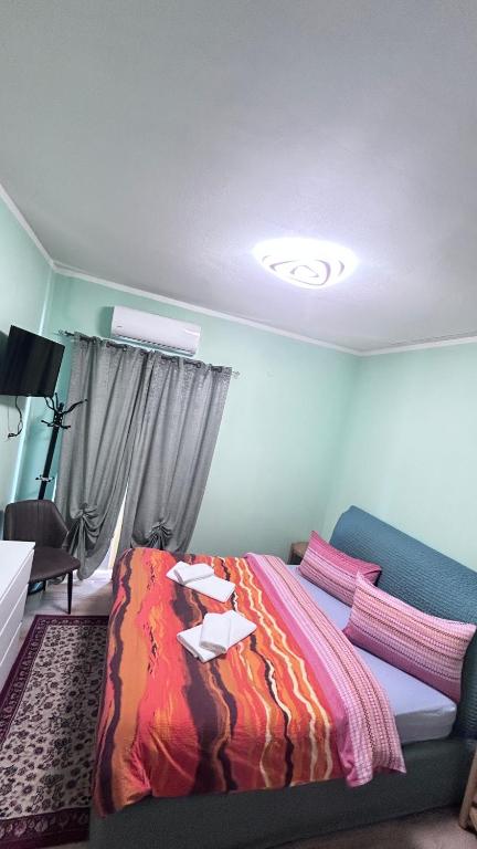 Postel nebo postele na pokoji v ubytování B&B Green's Harmony