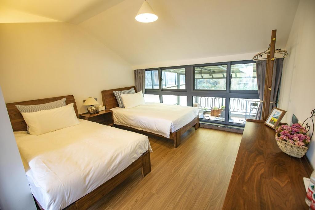 Postel nebo postele na pokoji v ubytování Shanghai Liudi Mingshe Boutique Bed and Breakfast